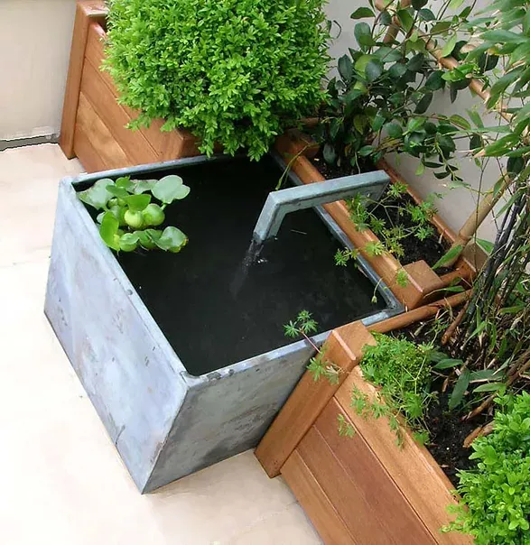 Installation de fontaine en zinc sur le Bassin d'Arcachon